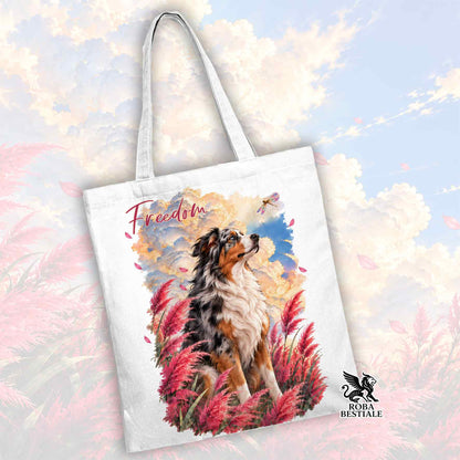 Borsa tote bianca con stampa cane e piume, scritta Freedom, logo