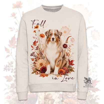 Felpa girocollo beige stampata con un Australian Shepherd seduto in mezzo a fiori e foglie autunnali. Grafica originale Roba Bestiale, collezione Fall in Love