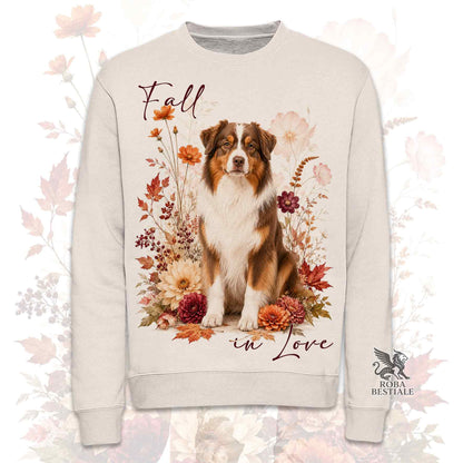 Felpa girocollo beige stampata con un Australian Shepherd seduto in mezzo a fiori e foglie autunnali. Grafica originale Roba Bestiale, collezione Fall in Love
