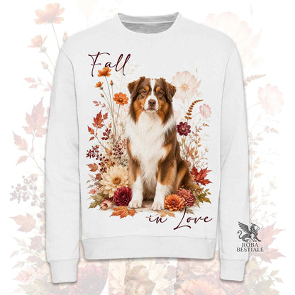 Felpa girocollo bianca stampata con un Australian Shepherd seduto in mezzo a fiori e foglie autunnali. Grafica originale Roba Bestiale, collezione Fall in Love