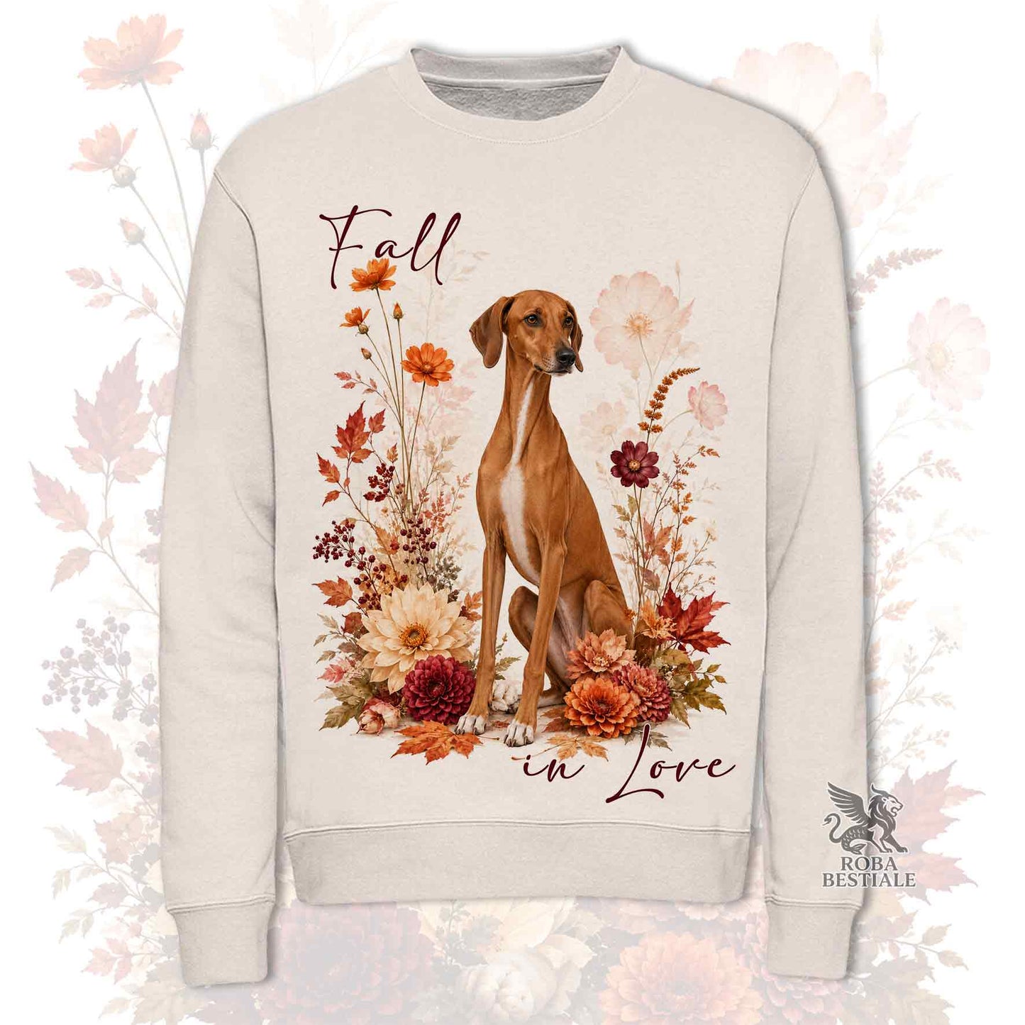 Felpa girocollo beige stampata con un Azawakh seduto in mezzo a fiori e foglie autunnali. Grafica originale Roba Bestiale, collezione Fall in Love