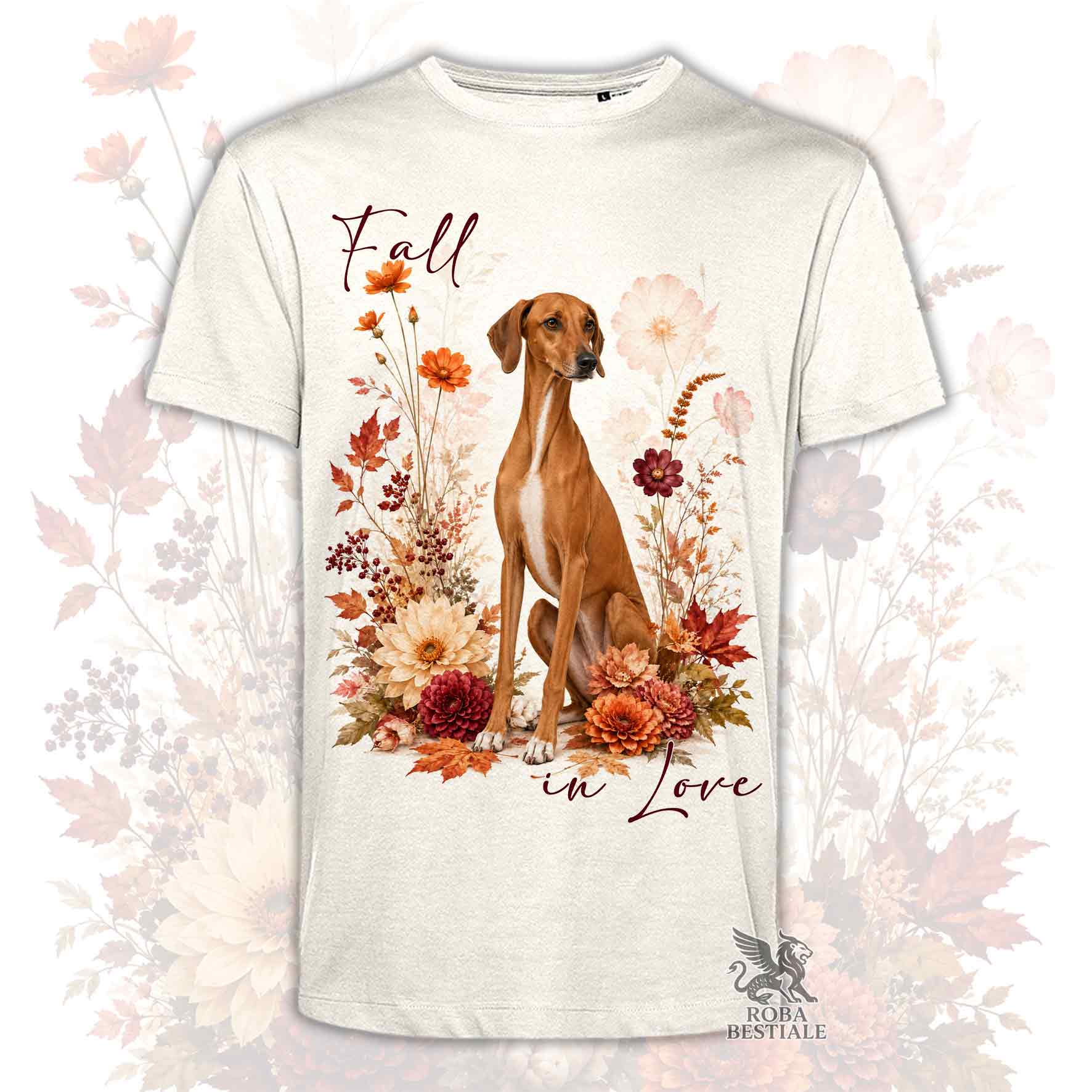 T-shirt beige stampata con un Azawakh seduto in mezzo a fiori e foglie autunnali. Grafica originale Roba Bestiale, collezione Fall in Love