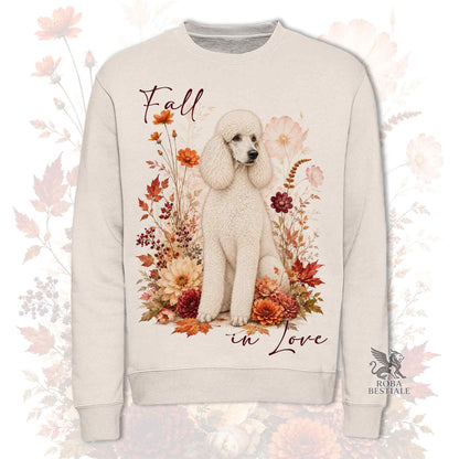 Felpa girocollo beige stampata con un Barbone Grande Mole bianco seduto in mezzo a fiori e foglie autunnali. Grafica originale Roba Bestiale, collezione Fall in Love