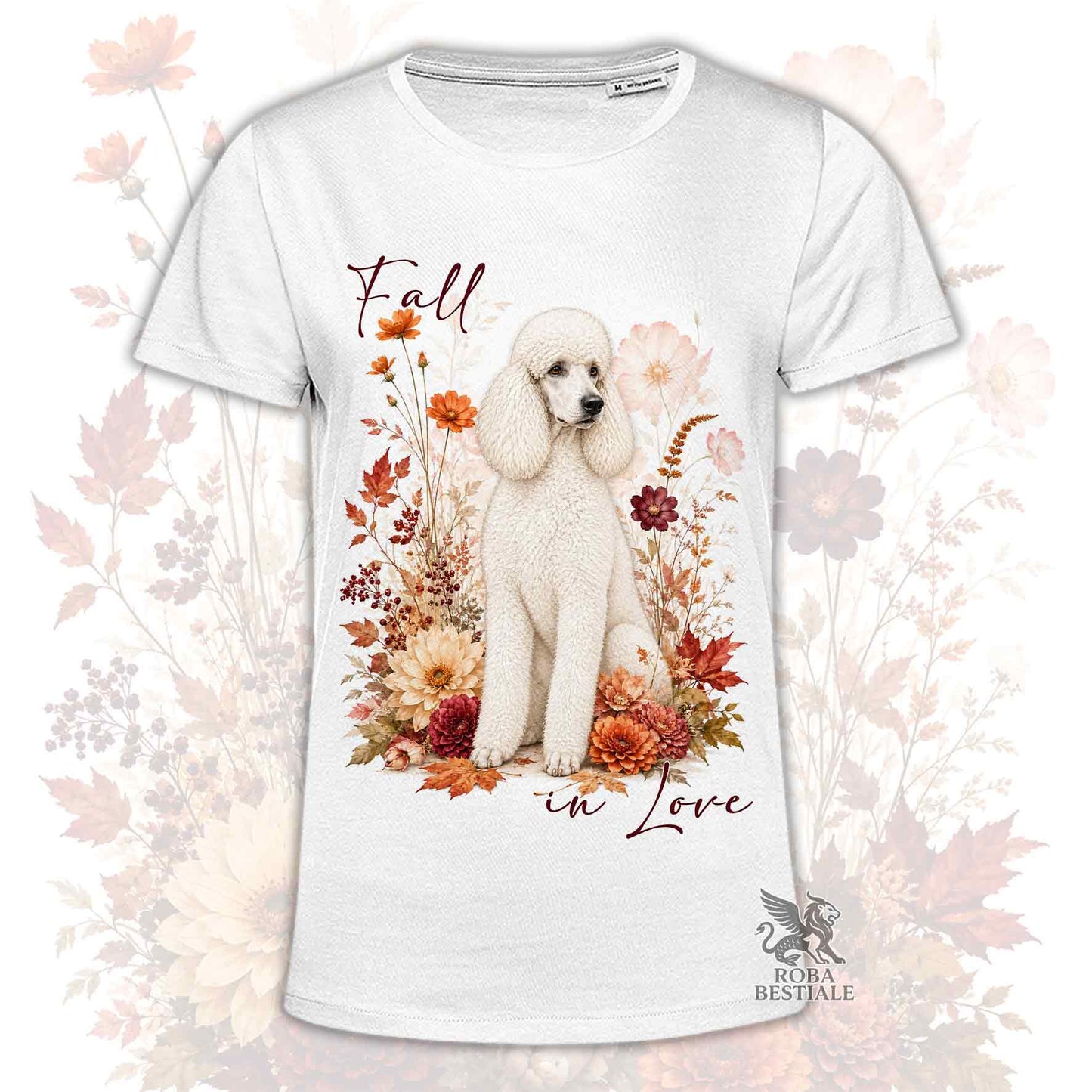 T-shirt bianca stampata con un Barbone grande mole seduto in mezzo a fiori e foglie autunnali. Grafica originale Roba Bestiale, collezione Fall in Love