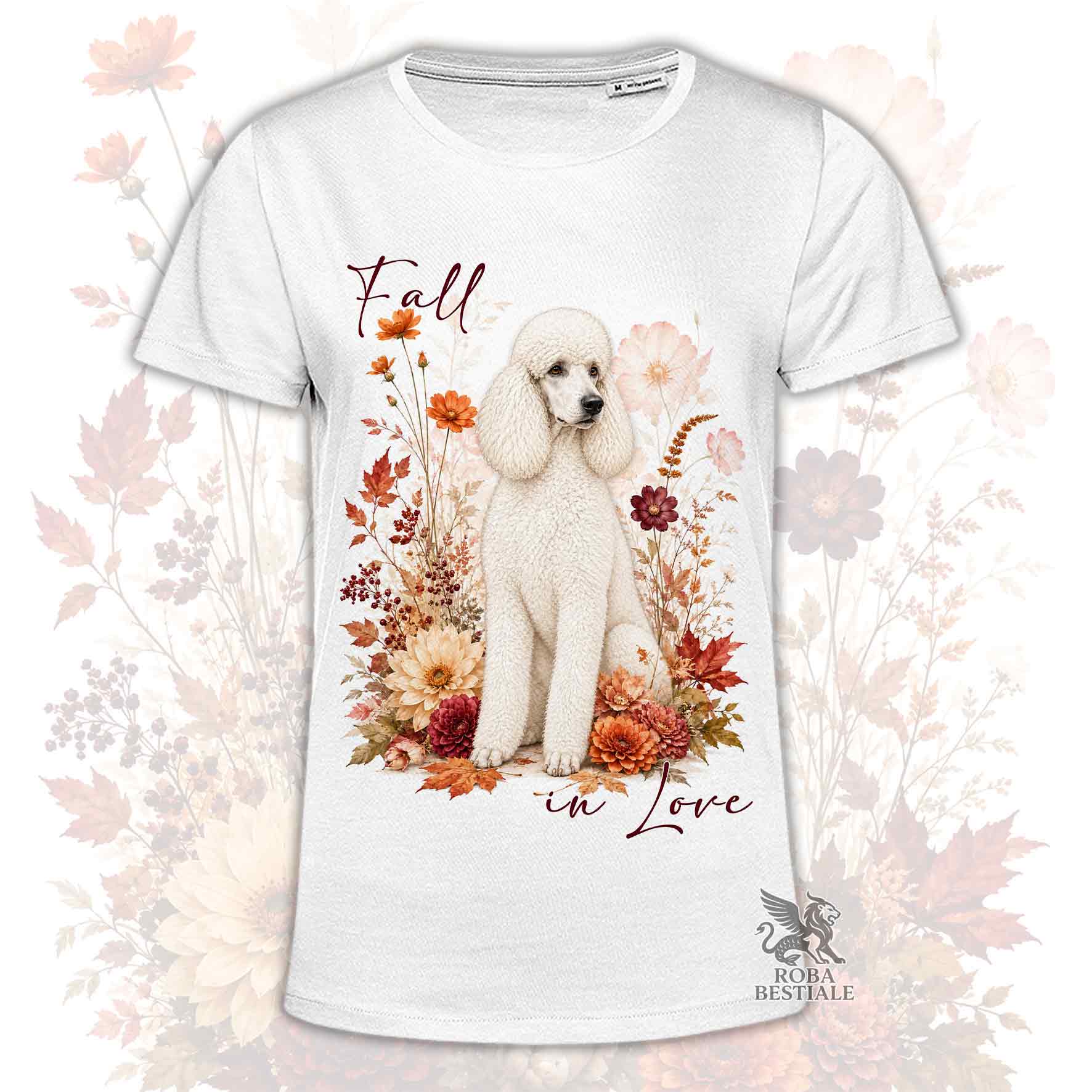 T-shirt bianca stampata con un Barbone grande mole seduto in mezzo a fiori e foglie autunnali. Grafica originale Roba Bestiale, collezione Fall in Love