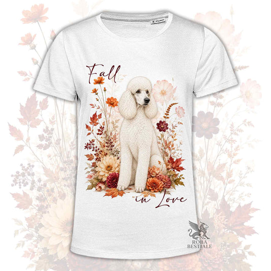 T-shirt bianca stampata con un Barbone grande mole seduto in mezzo a fiori e foglie autunnali. Grafica originale Roba Bestiale, collezione Fall in Love