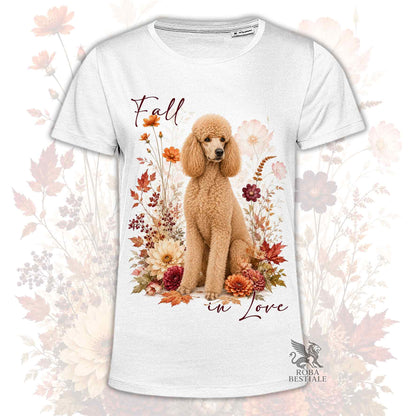 T-shirt bianca stampata con un Barbone grande mole seduto in mezzo a fiori e foglie autunnali. Grafica originale Roba Bestiale, collezione Fall in Love