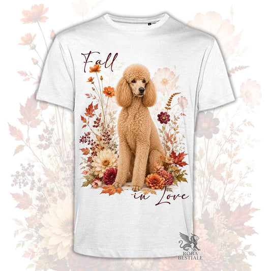 T-shirt bianca stampata con un Barbone grande mole seduto in mezzo a fiori e foglie autunnali. Grafica originale Roba Bestiale, collezione Fall in Love