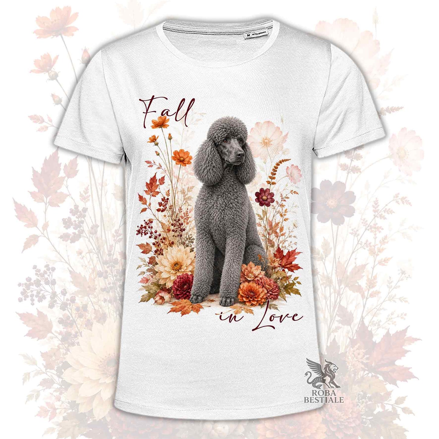 T-shirt bianca stampata con un Barbone grande mole seduto in mezzo a fiori e foglie autunnali. Grafica originale Roba Bestiale, collezione Fall in Love