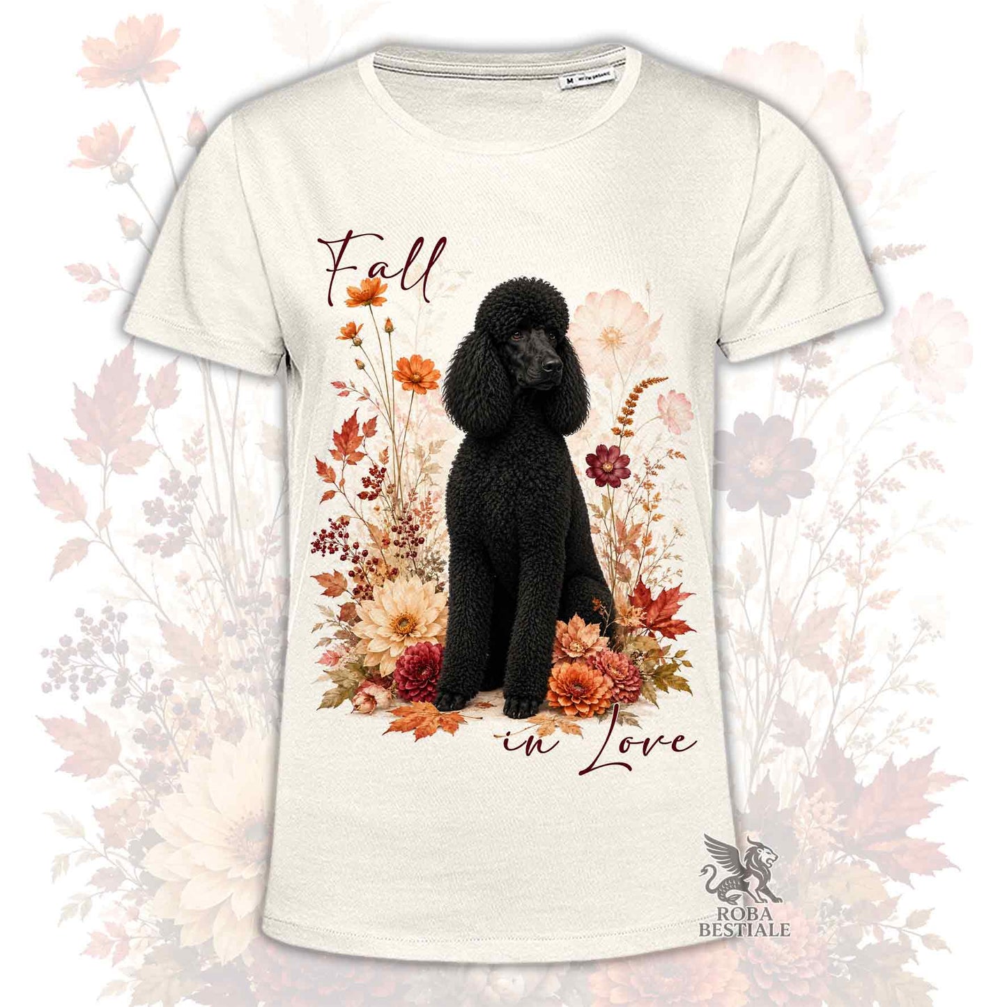 T-shirt beige stampata con un Barbone grande mole seduto in mezzo a fiori e foglie autunnali. Grafica originale Roba Bestiale, collezione Fall in Love