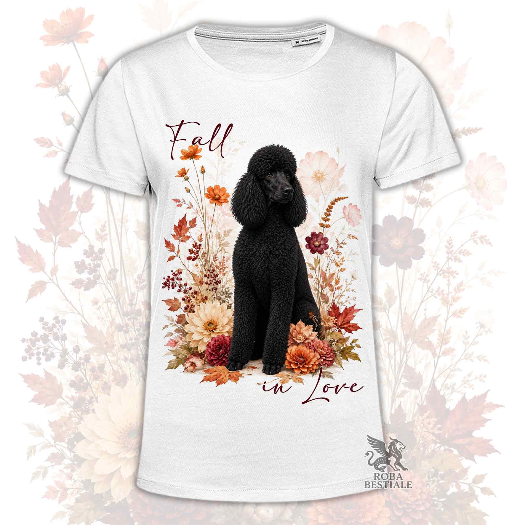 T-shirt bianca stampata con un Barbone grande mole seduto in mezzo a fiori e foglie autunnali. Grafica originale Roba Bestiale, collezione Fall in Love