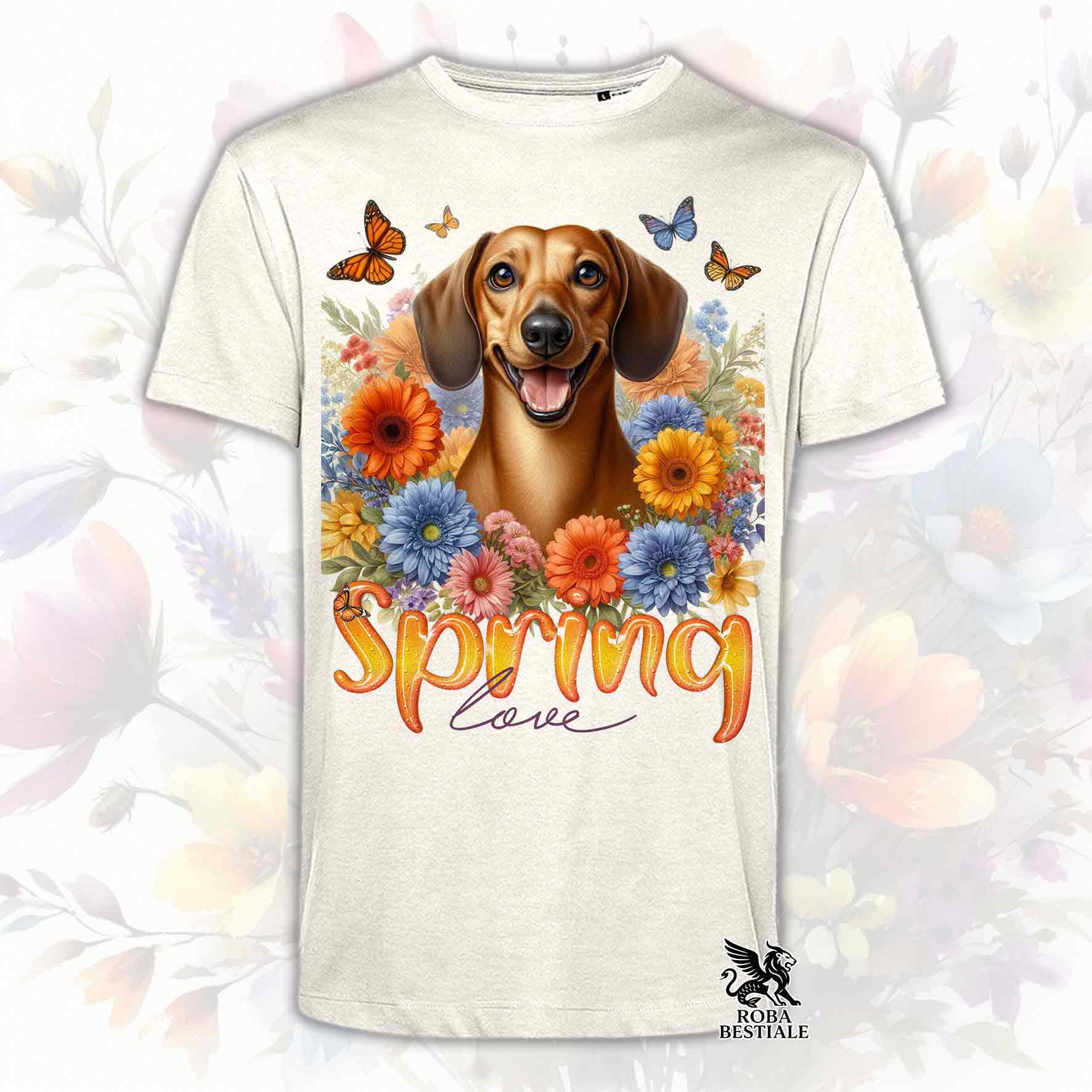 Una t-shirt beige stampata con un Bassotto a pelo corto immerso nei fiori colorati. Collezione Spring Love di Roba Bestiale