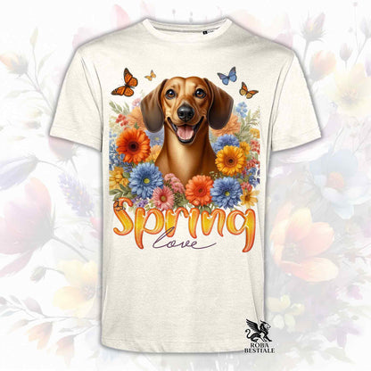 Una t-shirt beige stampata con un Bassotto a pelo corto immerso nei fiori colorati. Collezione Spring Love di Roba Bestiale