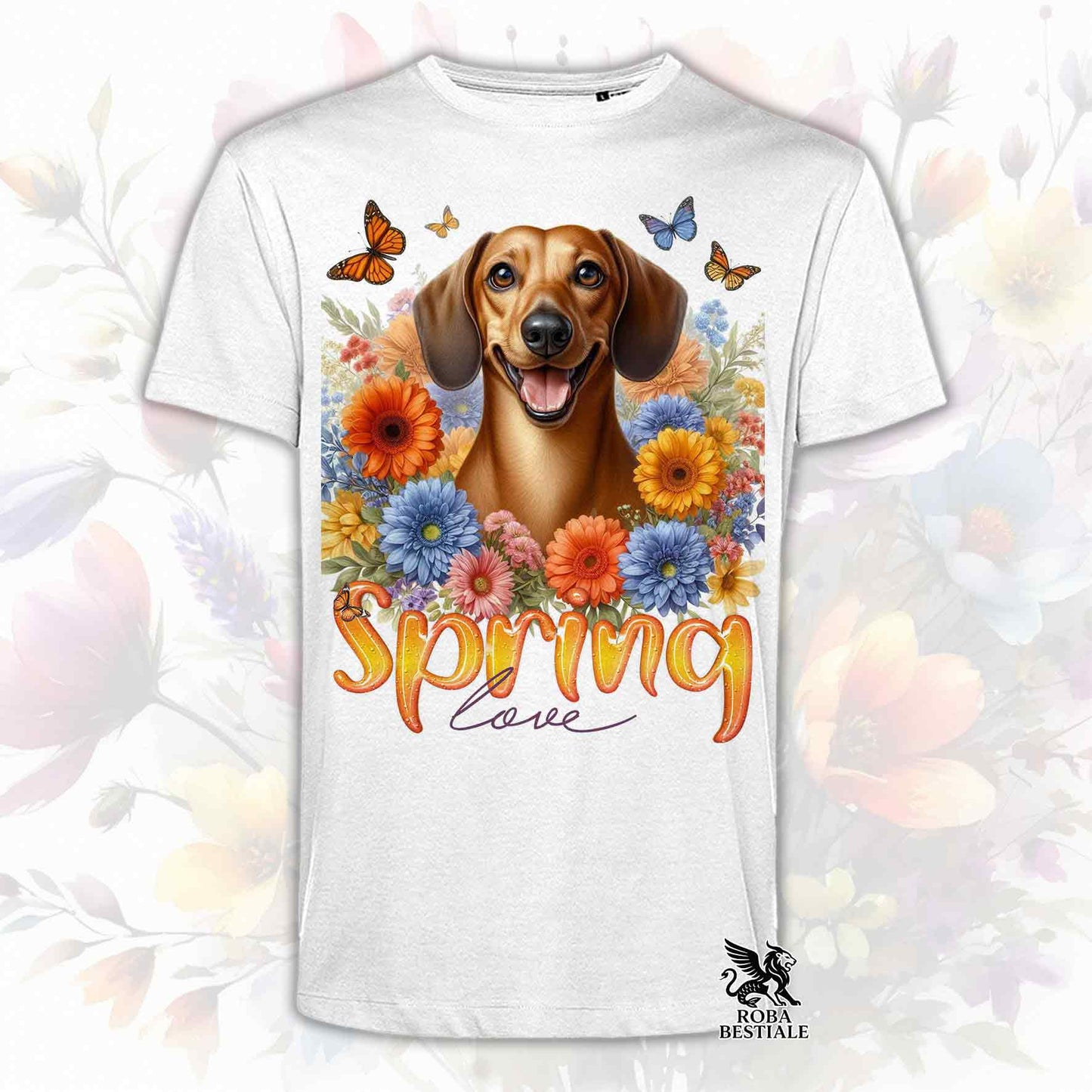 Una t-shirt bianca stampata con un Bassotto a pelo corto immerso nei fiori colorati. Collezione Spring Love di Roba Bestiale