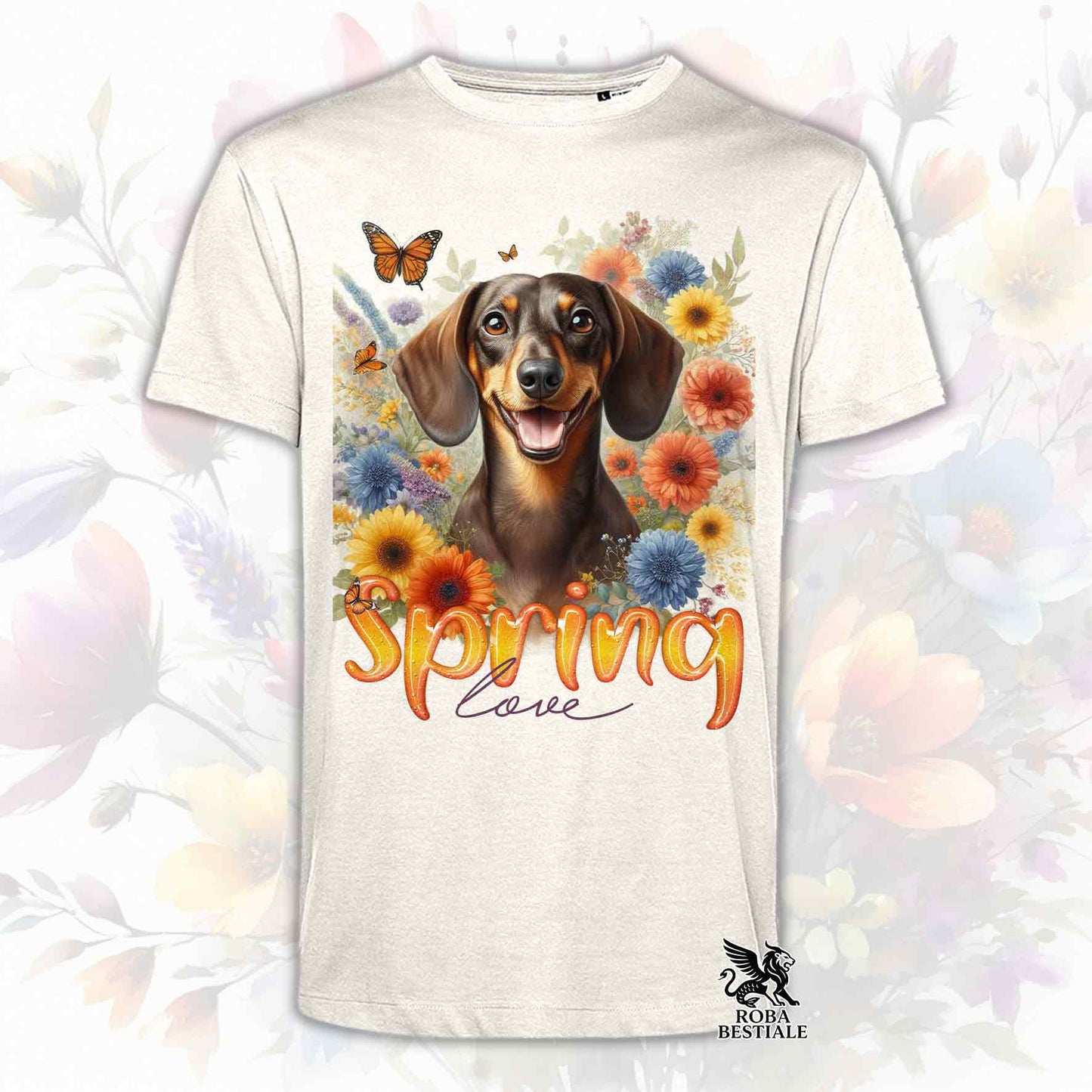 Una t-shirt beige stampata con un Bassotto a pelo corto immerso nei fiori colorati. Collezione Spring Love di Roba Bestiale