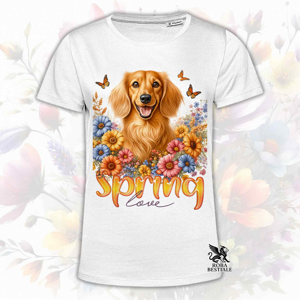 Una t-shirt bianca stampata con un Bassotto a pelo lungo immerso nei fiori colorati. Collezione Spring Love di Roba Bestiale