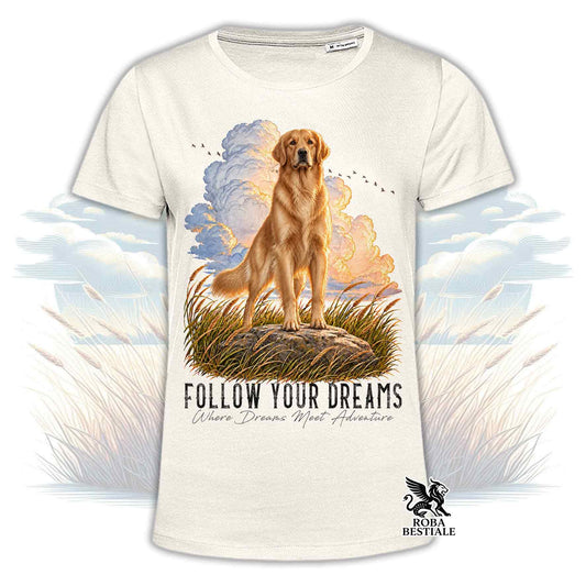 Maglietta beige con golden retriever in piedi e scritta “Follow Your Dreams”.