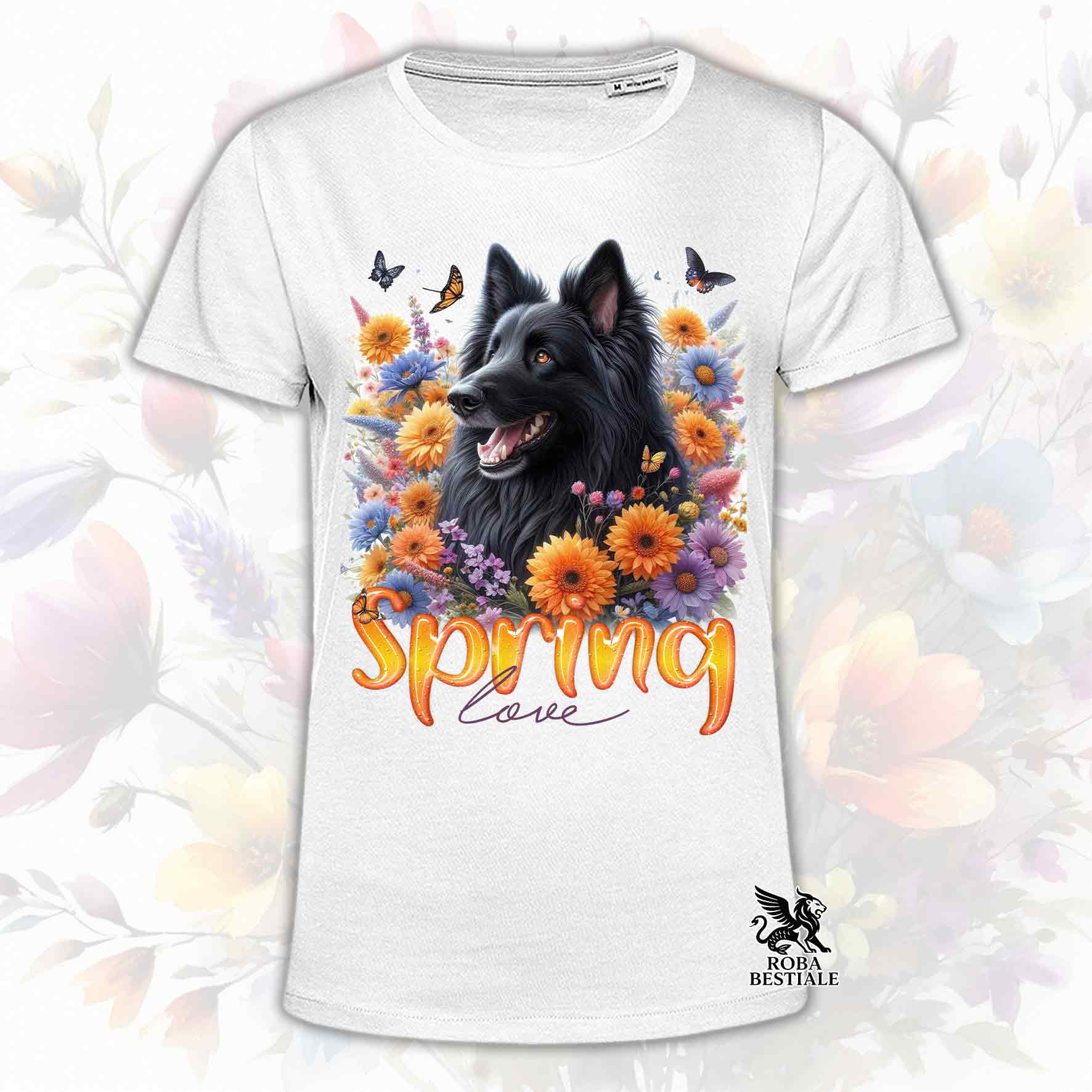 Una t-shirt bianca stampata con un Pastore Belga Groenendael immerso in fiori colorati. Collezione Spring Love di Roba Bestiale