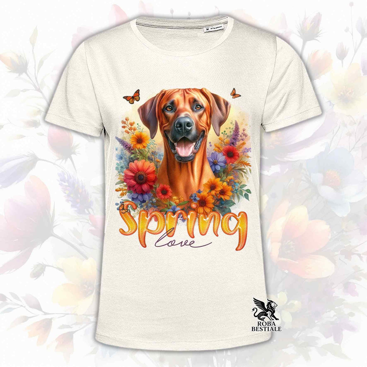 Una t-shirt beige stampata con un Rhodesian Ridgeback immerso in fiori colorati. Collezione Spring Love di Roba Bestiale