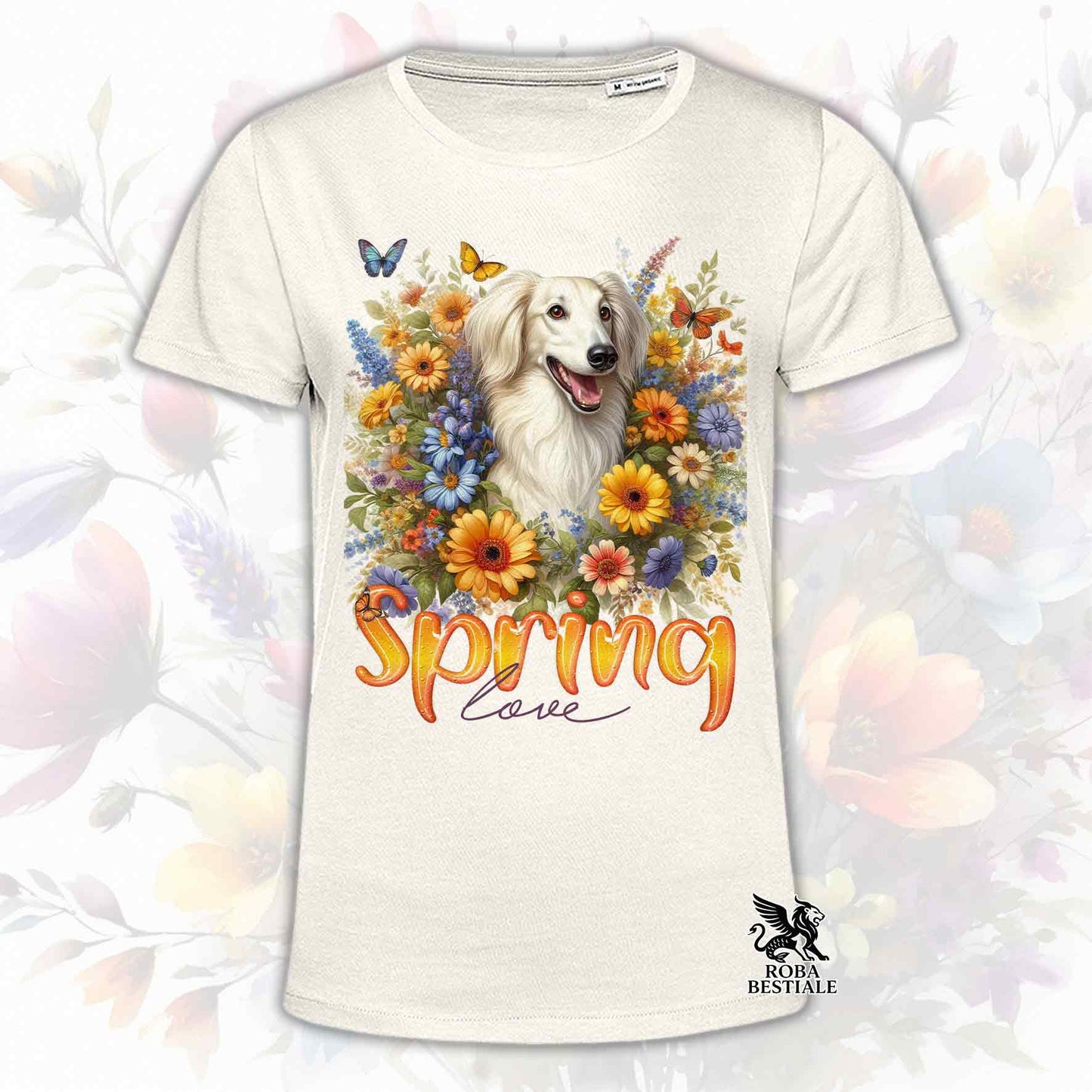 Una t-shirt beige stampata con un Saluki immerso nei fiori colorati. Collezione Spring Love di Roba Bestiale