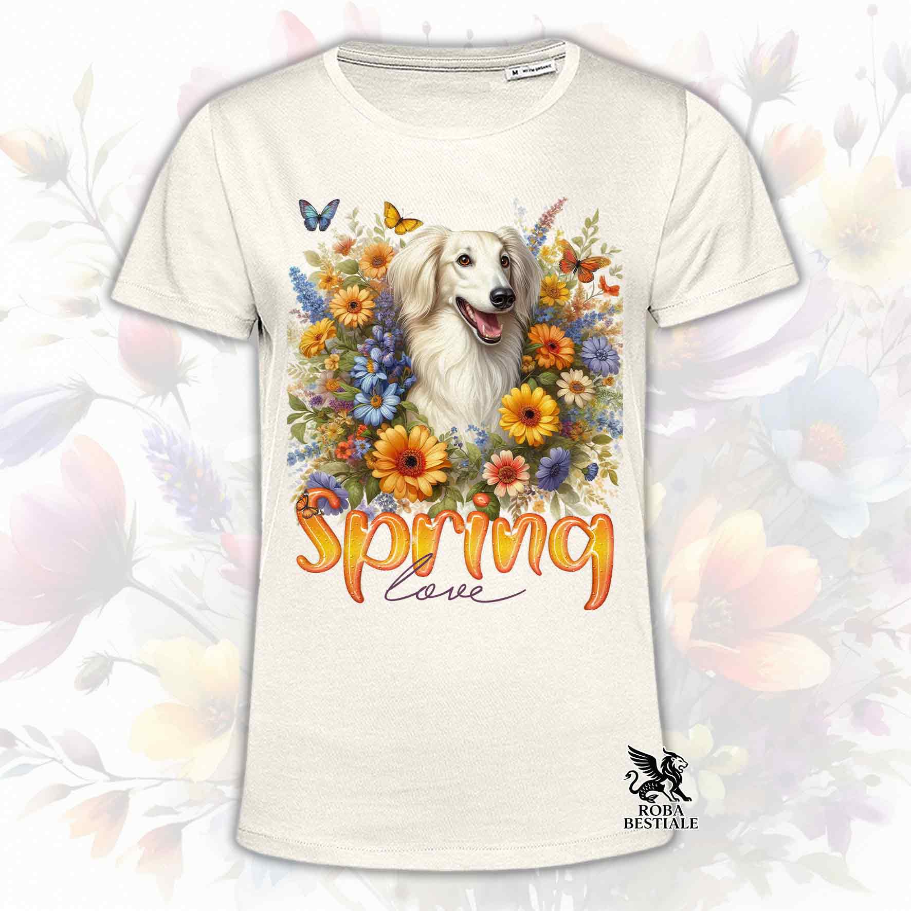 Una t-shirt beige stampata con un Saluki immerso nei fiori colorati. Collezione Spring Love di Roba Bestiale