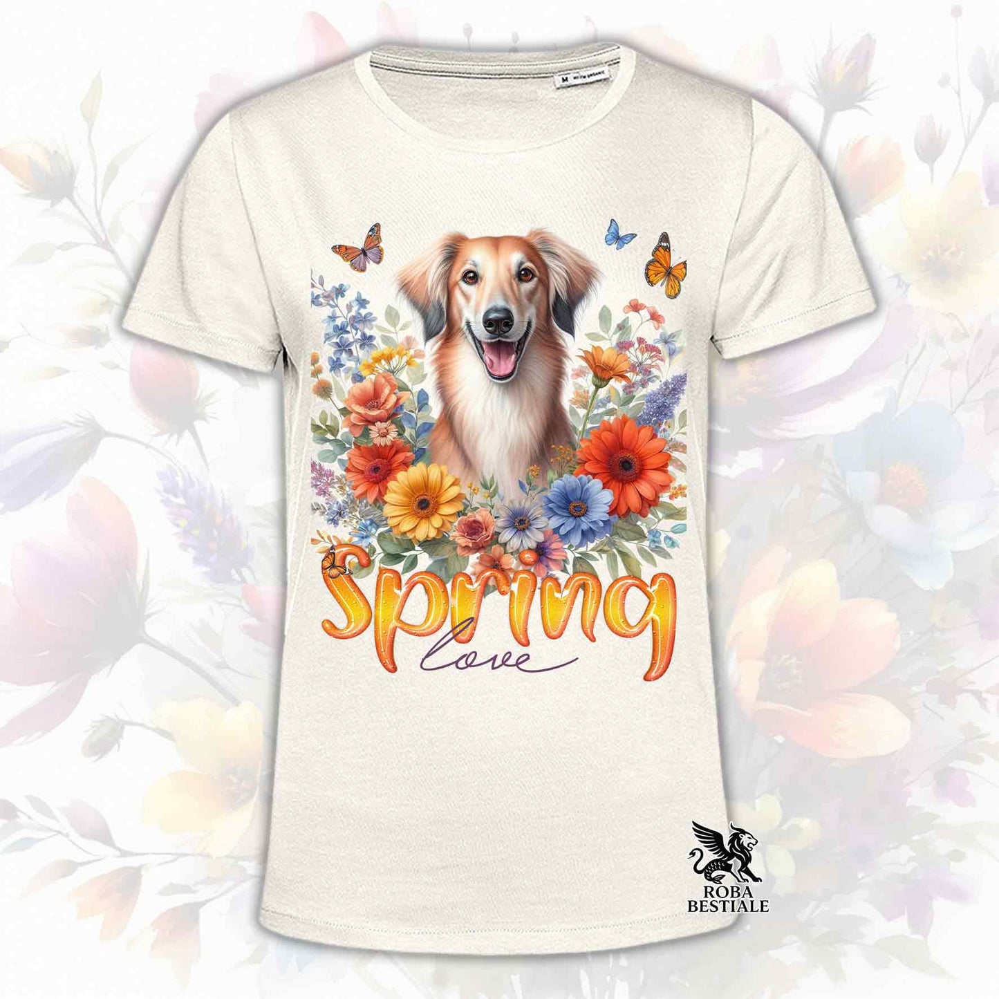 Una t-shirt beige stampata con un Saluki immerso in fiori colorati. Collezione Spring Love di Roba Bestiale