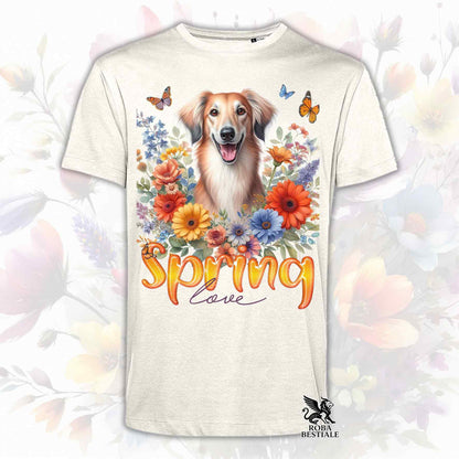 Una t-shirt beige stampata con un Saluki immerso in fiori colorati. Collezione Spring Love di Roba Bestiale