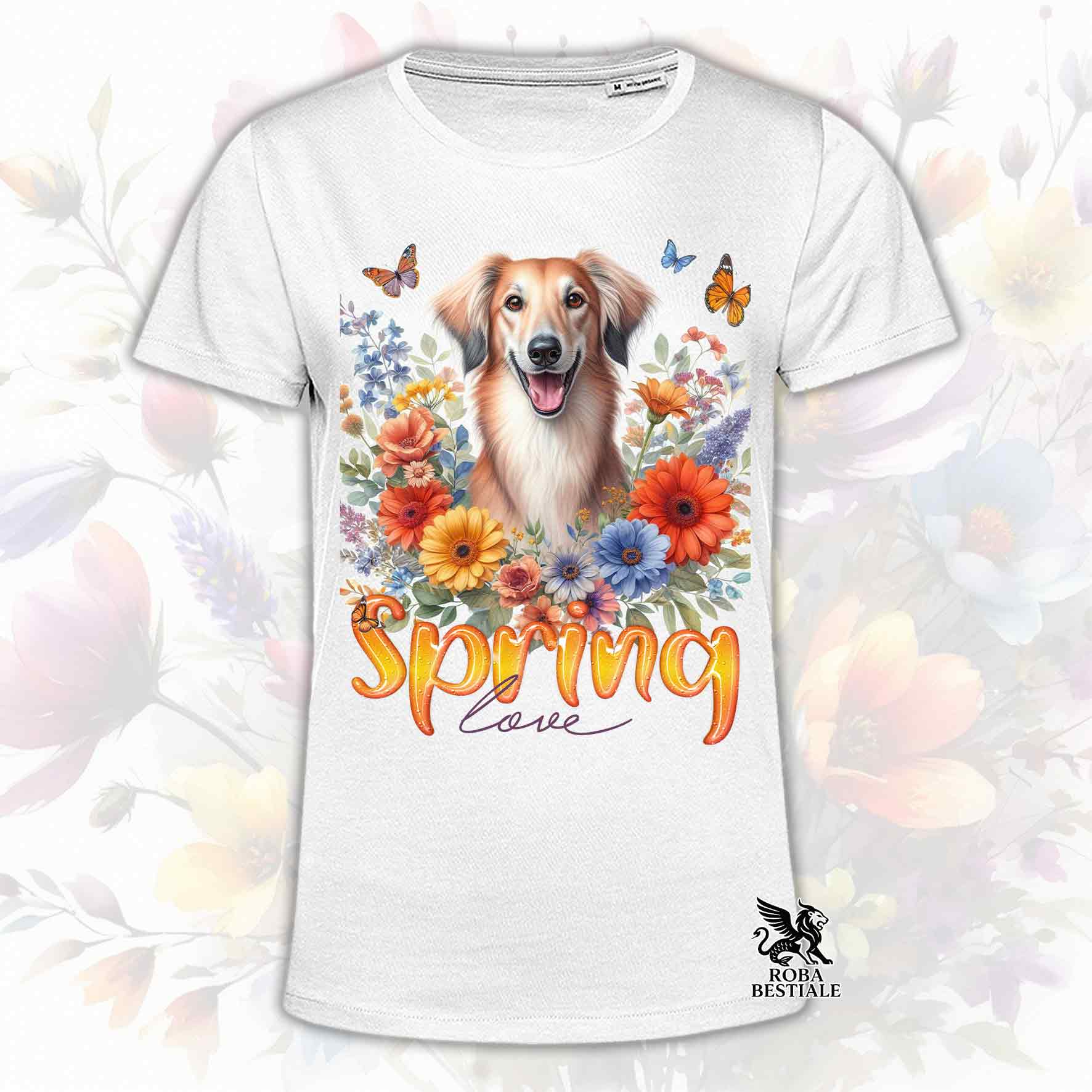 Una t-shirt bianca stampata con un Saluki immerso in fiori colorati. Collezione Spring Love di Roba Bestiale