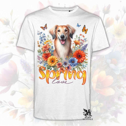 Una t-shirt bianca stampata con un Saluki immerso in fiori colorati. Collezione Spring Love di Roba Bestiale