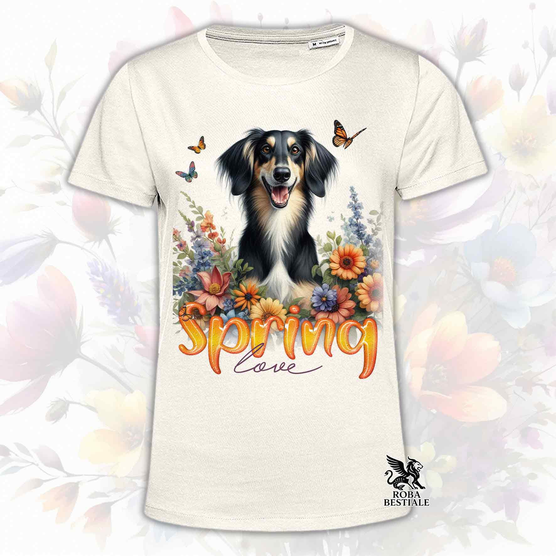 Una t-shirt beige stampata con un Saluki immerso in fiori colorati. Collezione Spring Love di Roba Bestiale