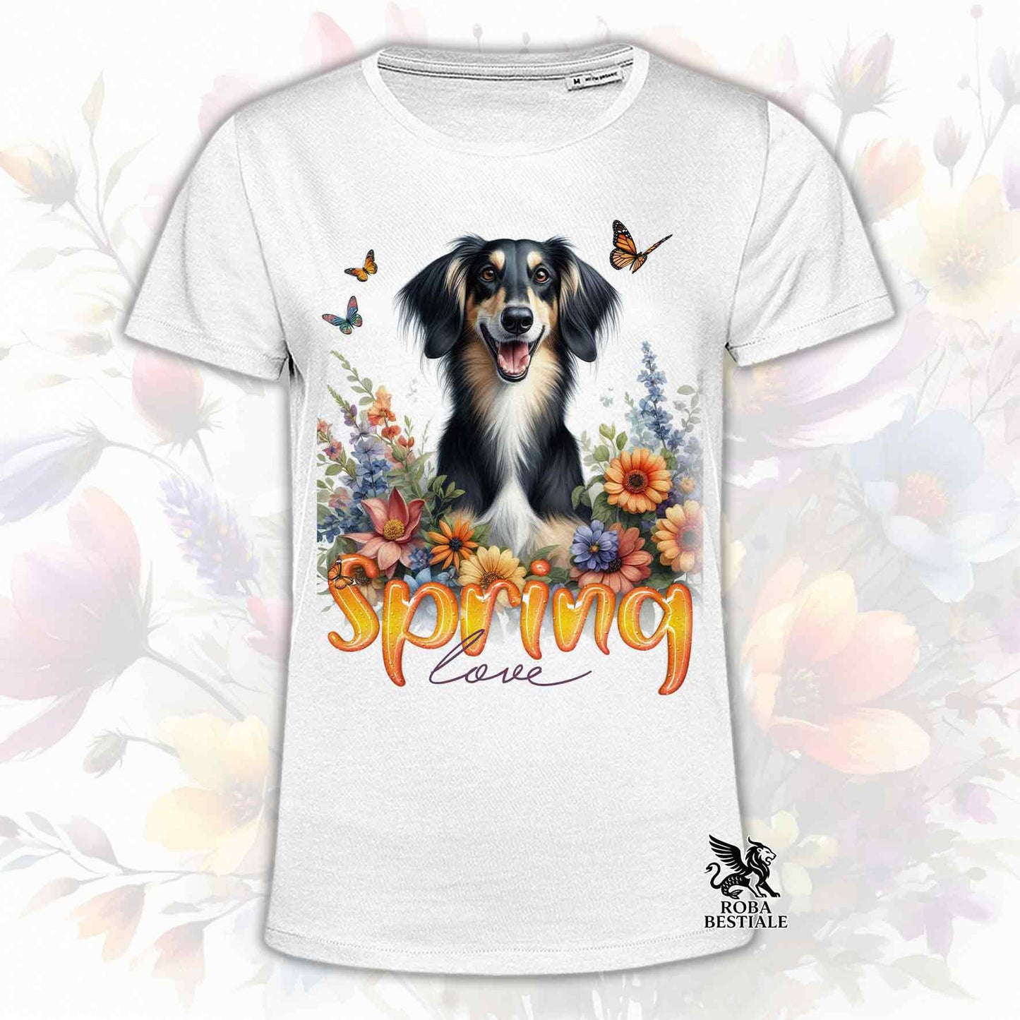 Una t-shirt bianca stampata con un Saluki immerso in fiori colorati. Collezione Spring Love di Roba Bestiale