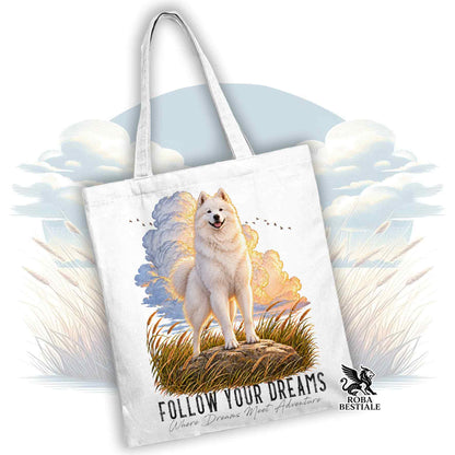 Shopper in cotone bianco con stampa cane e scritta “Follow Your Dreams”.