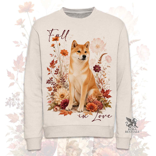 Felpa girocollo beige stampata con uno Shiba Inu seduto in mezzo a fiori e foglie autunnali. Grafica originale Roba Bestiale, collezione Fall in Love