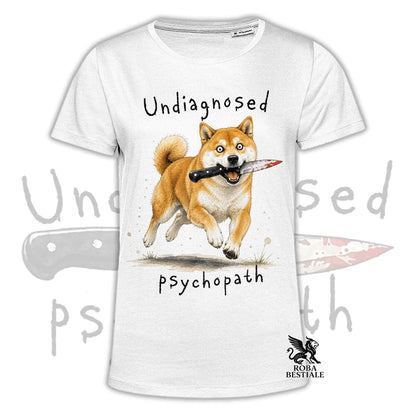 T-shirt bianca stampata con uno Shiba Inu che tiene un coltello tra i denti. Grafica originale Roba Bestiale, collezione Psychopath