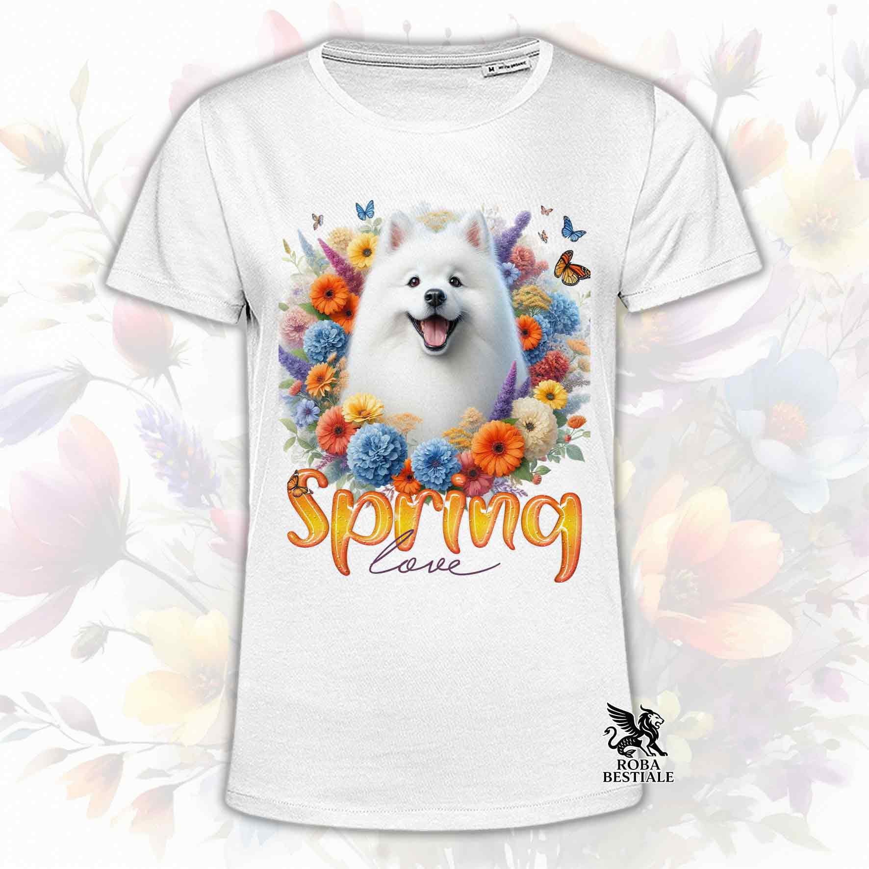 Una t-shirt bianca stampata con uno Spitz Giapponese immerso in fiori colorati. Collezione Spring Love di Roba Bestiale