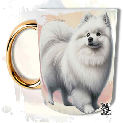 Tazza con Spitz Tedesco Medio Bianco, stampata con grafica Behavior, manico oro, fronte