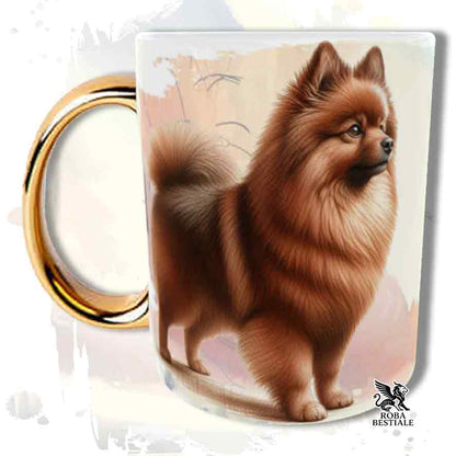 Tazza con Spitz Tedesco Medio Marrone, stampata con grafica Behavior, manico oro, fronte