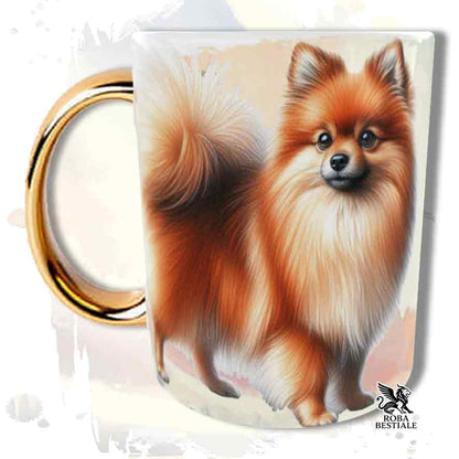 Tazza con Spitz Tedesco Piccolo arancio, stampata con grafica Behavior, manico oro, fronte