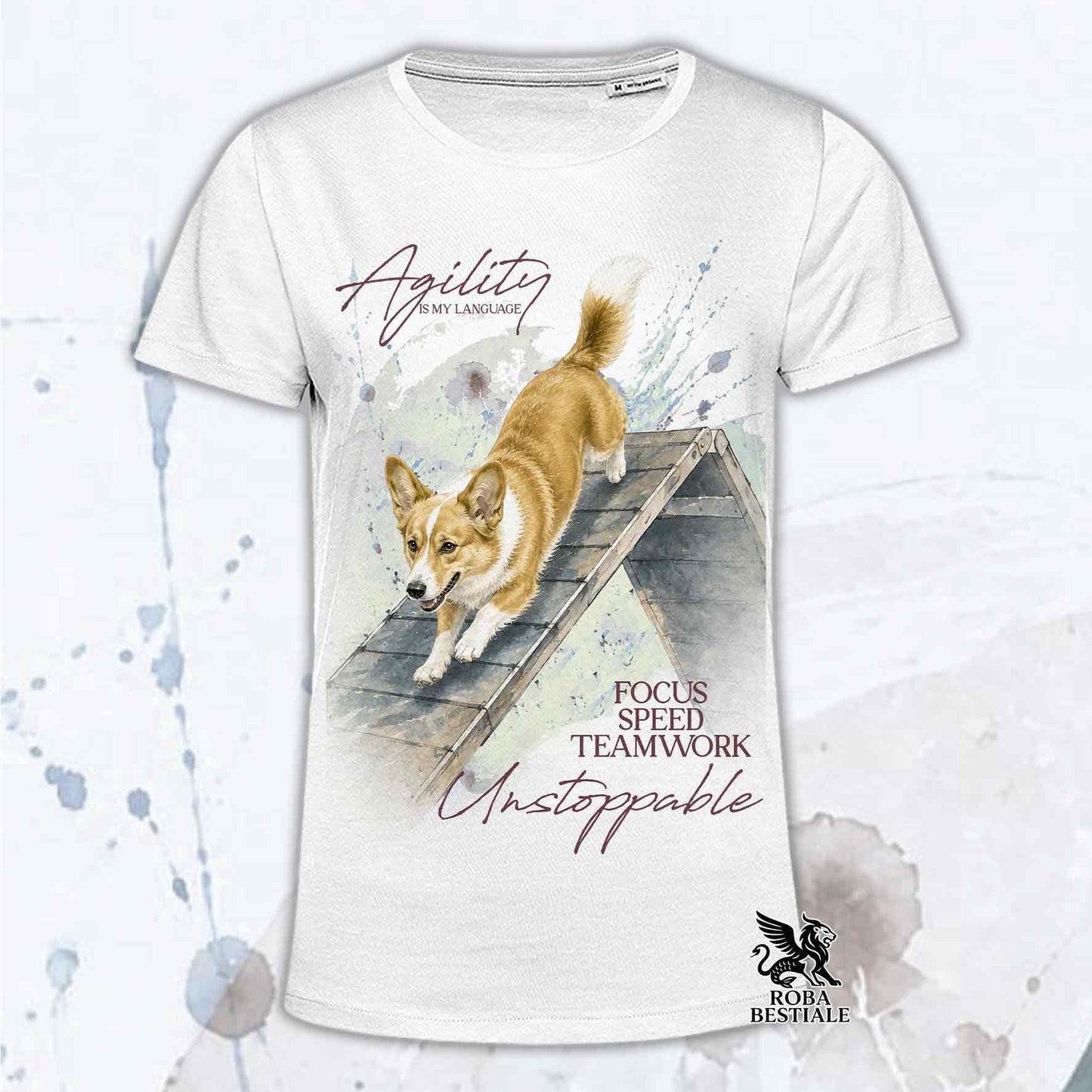 T-shirt bianca stampata con un Welsh Corgi Cardigan che fa Agility. Grafica originale Roba Bestiale, collezione A-Frame