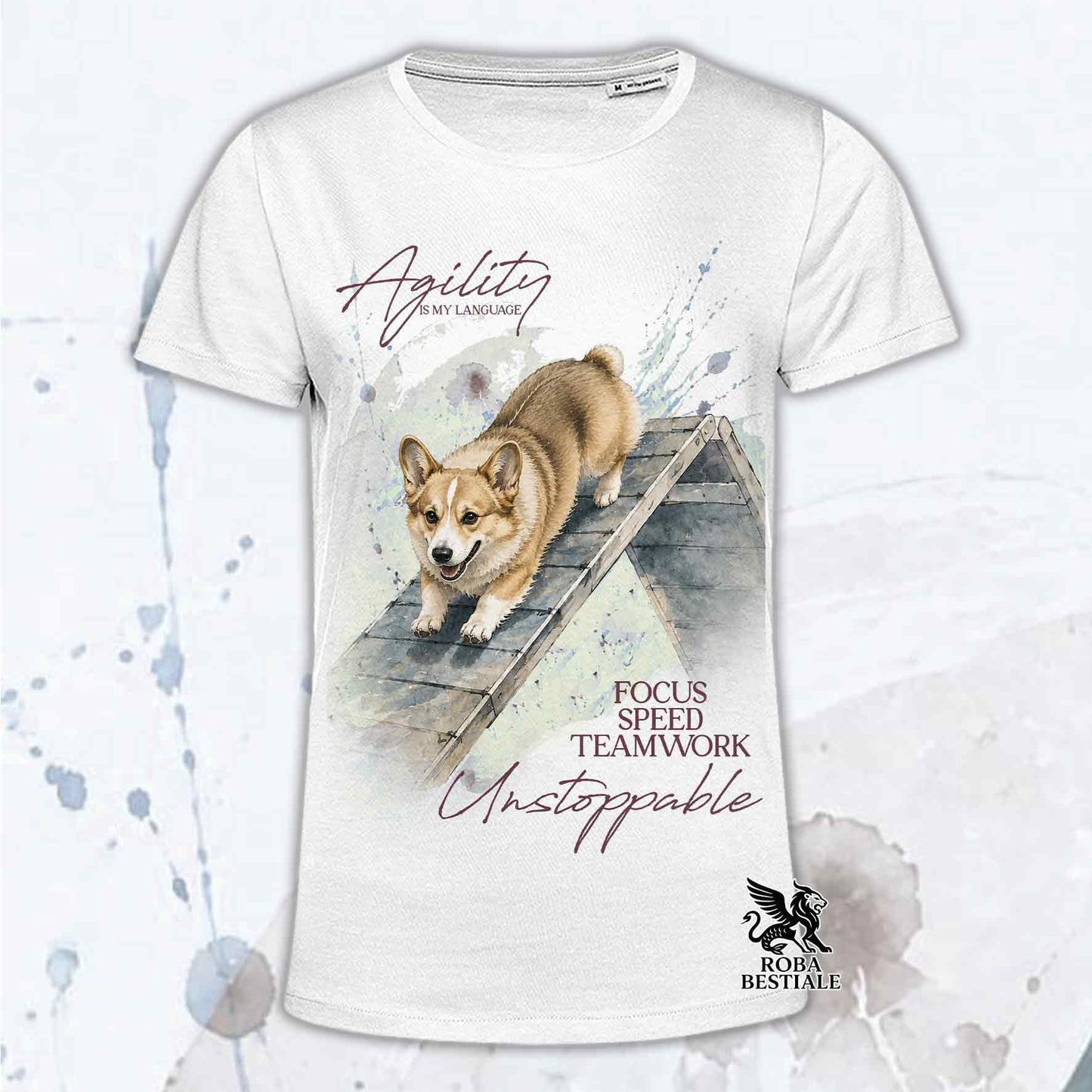 T-shirt bianca stampata con un Welsh Corgi Pembroke che fa Agility. Grafica originale Roba Bestiale, collezione A-Frame